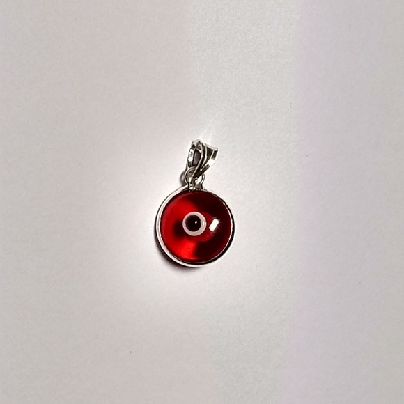 Jewelry - Glass Evil eye Sterling silver pendant NWOT